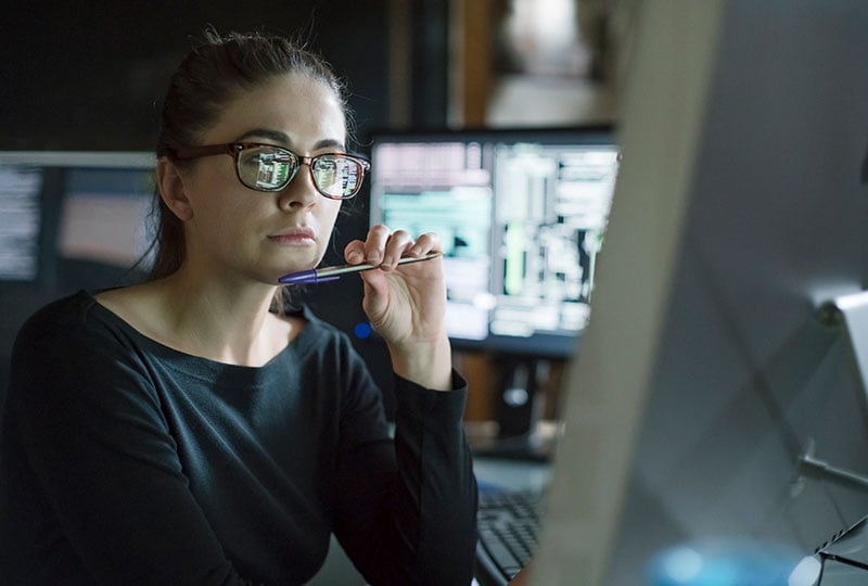 woman looking at monitor