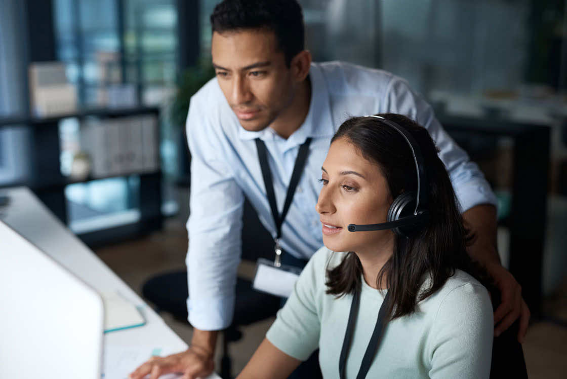 two people working