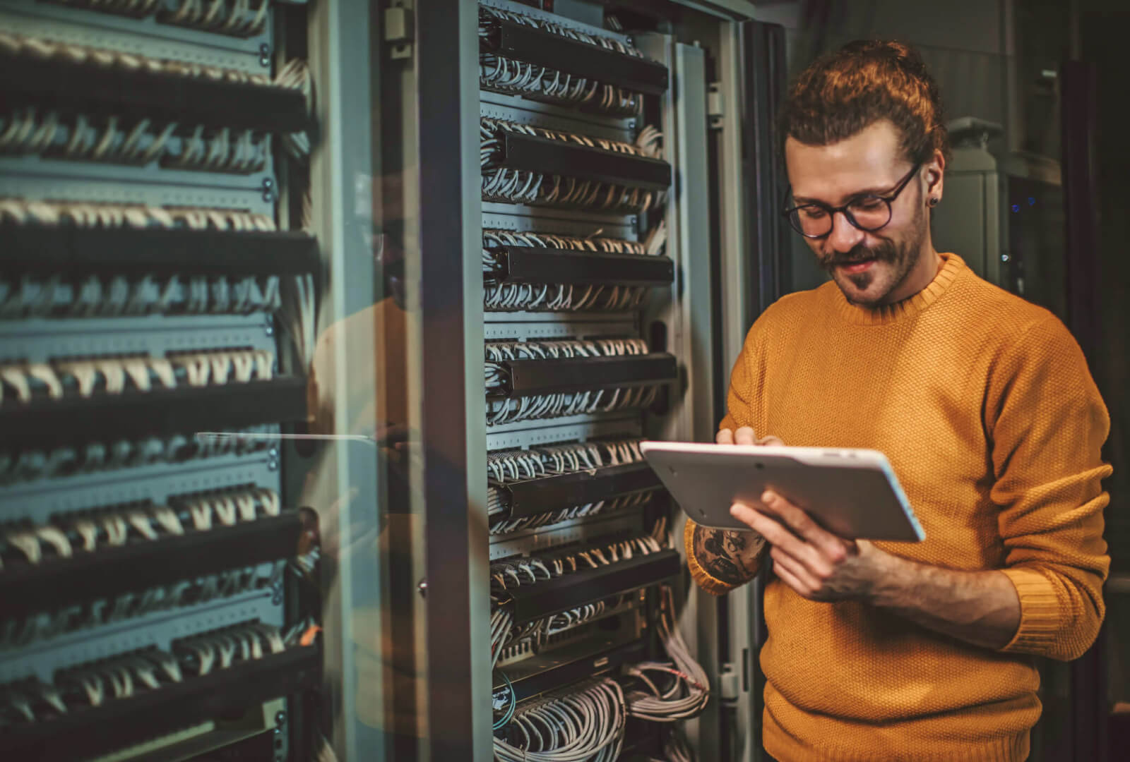 administrator working in a server array